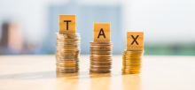 immagine con la scritta tax